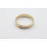 9ct gold diamond fronted band ring weighs 2.1 grams . Fully hallmarked for 9ct gold. Uk size L