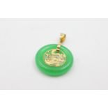 14ct gold jadeite chinese pendant . Weighs 2.4 grams . Measures 2.8cm x 1.9cm wide .Marked 585 for