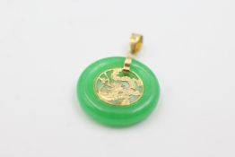 14ct gold jadeite chinese pendant . Weighs 2.4 grams . Measures 2.8cm x 1.9cm wide .Marked 585 for