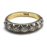 Fine 18ct gold and seven stone diamond Half eternity ring. Marked 18ct. Uk size M 1/2 . Weighs 3.6