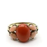 Fine 9ct gold and natural coral ring. Marked 375 as well as 9ct for 9ct gold. Set with a large