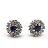 Fine 18ct white gold and diamond stud earrings. Measures 9mm wide. Set with sapphires in the