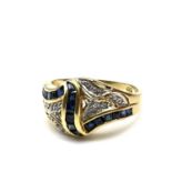 Fine 18ct gold sapphire and diamond ring . Marked 750 for 18ct gold. Set with diamonds and