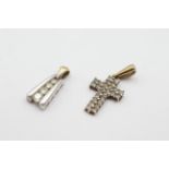 2 x 9ct gold diamond detailed pendants weighs 1.8 grams. Both pendants are set with diamonds and
