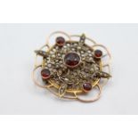 9ct gold antique seed pearl & garnet cutwork brooch weighs 3.9grams. Set with garnets and natural