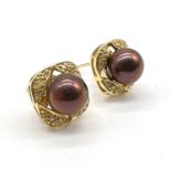 Fine 14 CT gold grey pearl and diamond stud earrings. Set in solid 14 carat gold with grey