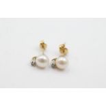 9ct gold pearl & diamond stud earrings - weighs 1.2 grams . Set in 9ct gold with pearls measuring