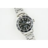 ROLEX OYSTER PERPETUAL DATE SUBMARINER REF. 16610 CIRCA 1997, circular black dial with hour