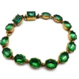 Antique georgian gold cased and green paste domed backed bracelet. Set with a gold casing over