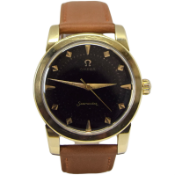 OMEGA SEAMASTER WRISTWATCH MODEL 2759-2 WITH ORIGINAL BLACK DIAL IN GOLD-CAPPED CASE 1956. SERIAL