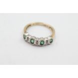 9ct gold 20 point diamond & emerald fronted half eternity weighs 2.4 grams . Set with alternating