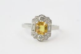 Yellow sapphire and diamond ring with baguette and round diamonds. Yellow sapphire estimated 1