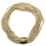 Vintage gold plated designer CINER faux pearl necklace . Signed CINER with a large gold plated clasp