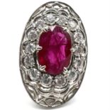 Fine platinum 2.95 carat natural ruby and diamond ring. Set with a 2.95 carat ruby in the center
