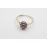 9ct gold amethyst & diamond halo ring - weighs 1.4 grams . Set with a amethyst in the center