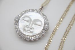 Fine 9ct Gold Diamond and Mother of Pearl Moonface Pendant Necklace Set with a carved Mother of