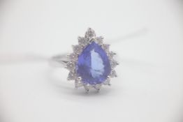 Fine 14ct Gold Pear Shaped Tanzanite and 60pt Diamond Ring Set with a very large pearl shaped