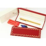 *TO BE SOLD WITHOUT RESERVE* MUST DE CARTIER FOUNTAIN PEN WITH BOX AND PAPERS, gilt case with red