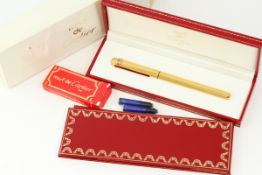 *TO BE SOLD WITHOUT RESERVE* MUST DE CARTIER FOUNTAIN PEN WITH BOX AND PAPERS, gilt case with red