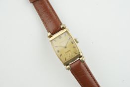 LONGINES GOLD PLATED TANK STYLE WRISTWATCH, rectangular patina dial with hands and arabic numeral