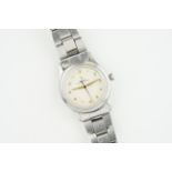 ROLEX OYSTER PERPETUAL FLAT EDGE ARABIC DIAL REF. 6532 CIRCA 1957, circular off whitw dial with gold