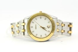 *TO BE SOLD WITHOUT RESERVE* GUCCI DRESS WATCH, white dial, diamond set hour markers, steel and gold