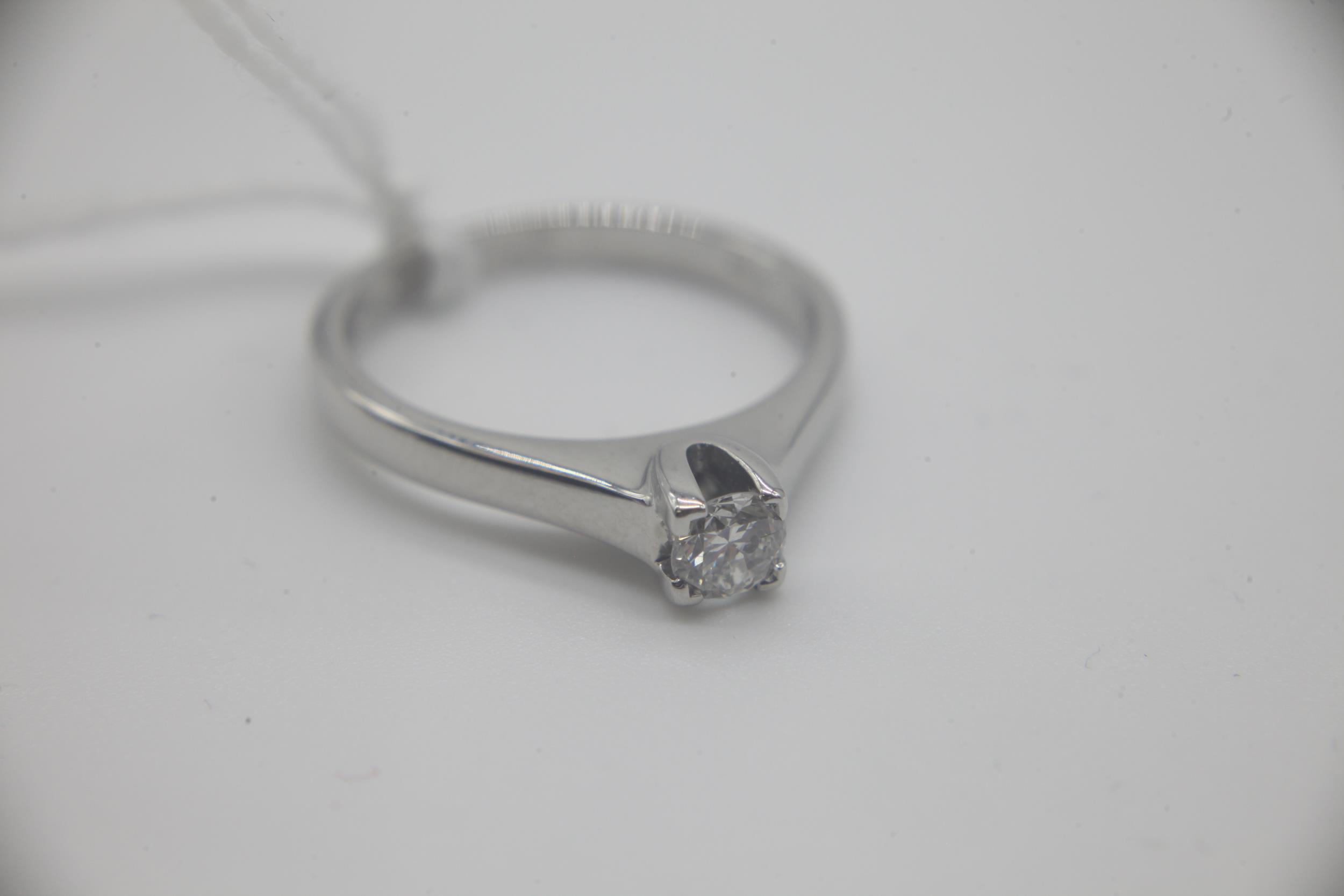 Fine 18ct White Gold BREV 30pt Solitaire Ring Set in 18ct White Gold also signed BREV on the