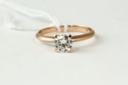 18kt Rose gold solitaire diamond ring, approximately 0.73cts G/SI1, weighs 2.3 grams . Uk size N,