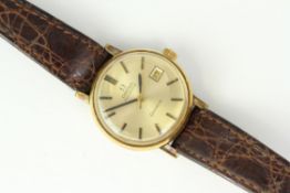 AUTOMATIC LADIES OMEGA GENEVE, Champagne dial with date function. 23mm gold plated case. On a