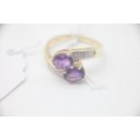 Fine 14ct Gold Amethyst and Diamond Twist Ring Set with Amethysts and Diamonds. Marked 14K. UK