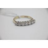 Fine 18ct Gold and Seven Stone Diamond Ring Fully hallmarked for 18ct Gold. Set with seven Brilliant