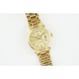 ROLEX OYSTER PERPETUAL DAY-DATE 18CT GOLD 'WIDE BOY' REF. 1803 CIRCA 1970, circular champagne pie