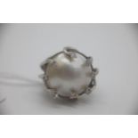 Fine 14ct gold diamond and mabe pearl dress ring. Set with a large mabe pearl surrounded by