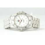 TAG HEUER AUTOMATIC 200M REFERENCE WE2111, white dial with luminous hour markers, steel rotating