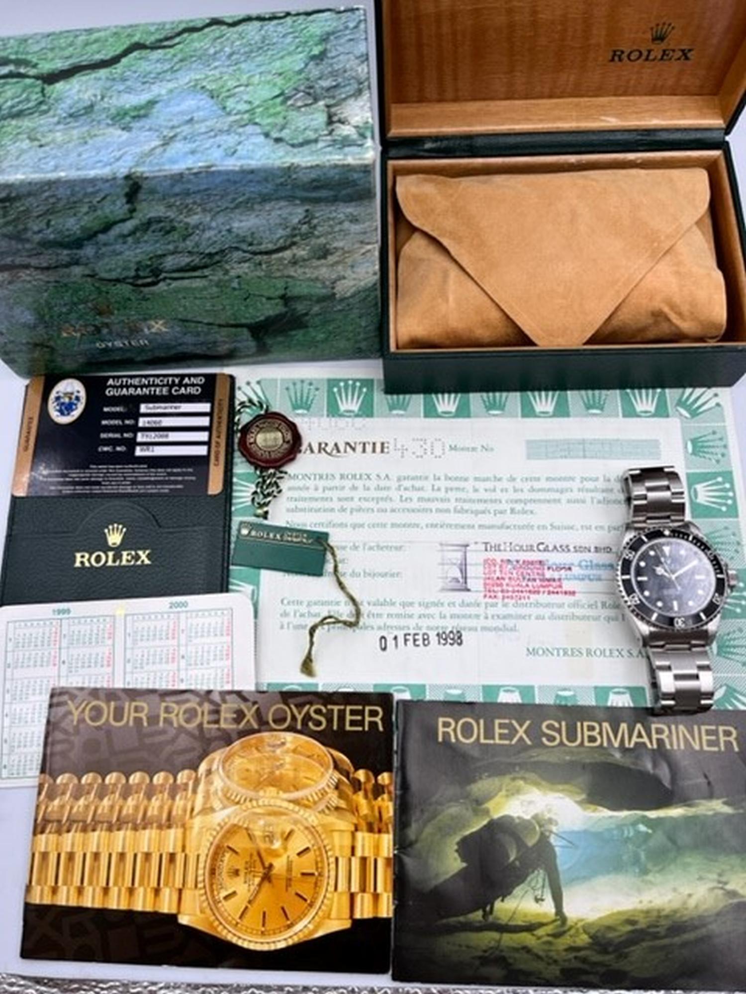 ROLEX SUBMARINER NO DATE 14060 WITH BOX AND PAPERS 1998