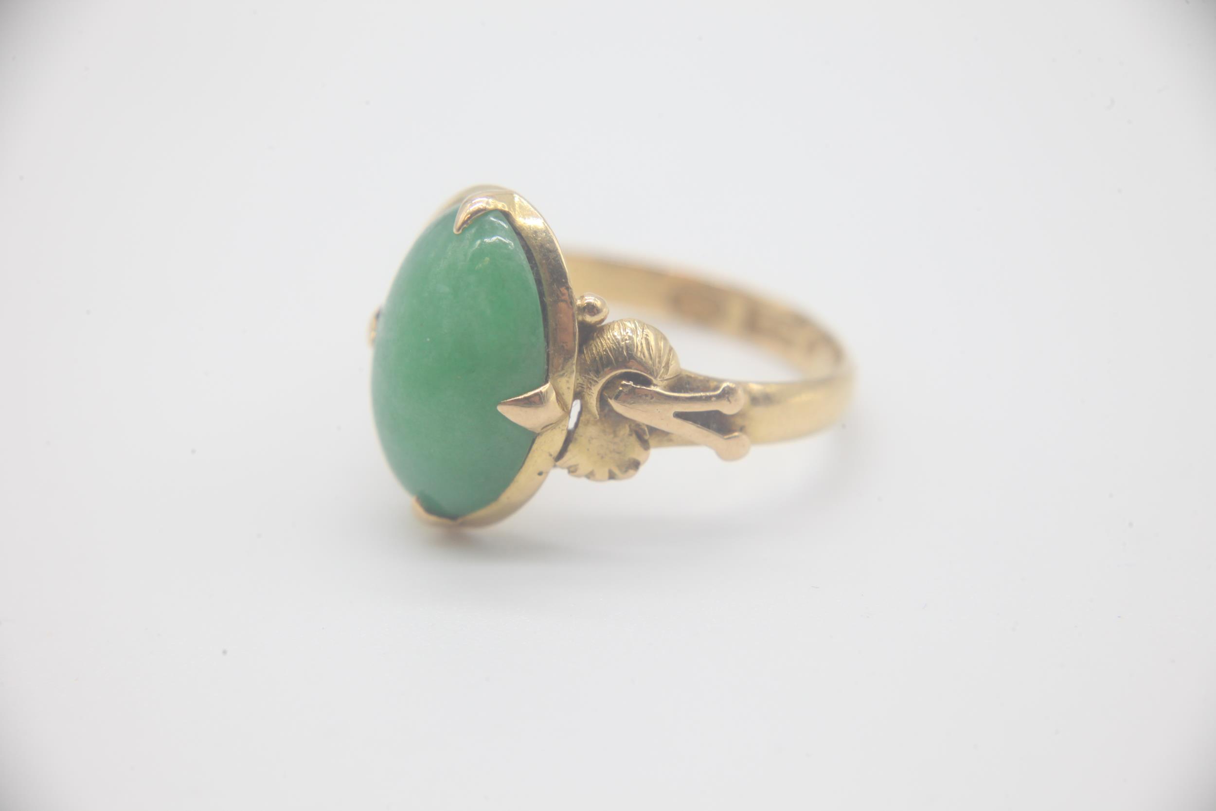 Antique Chinese 22ct Gold and Jade RingMarked 22K as well as Chinese Characters on the inside of the