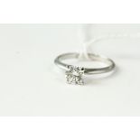 18kt White gold solitaire diamond ring, approximately 0.72cts H/VS2 . Weighs 2.3 grams. Uk size