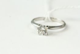 18kt White gold solitaire diamond ring, approximately 0.72cts H/VS2 . Weighs 2.3 grams. Uk size