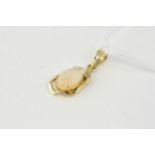 Fine 14ct Gold and Opal Pendant Set with a Large Etheopian Opal in a 14ct Gold Mount marked 14K.