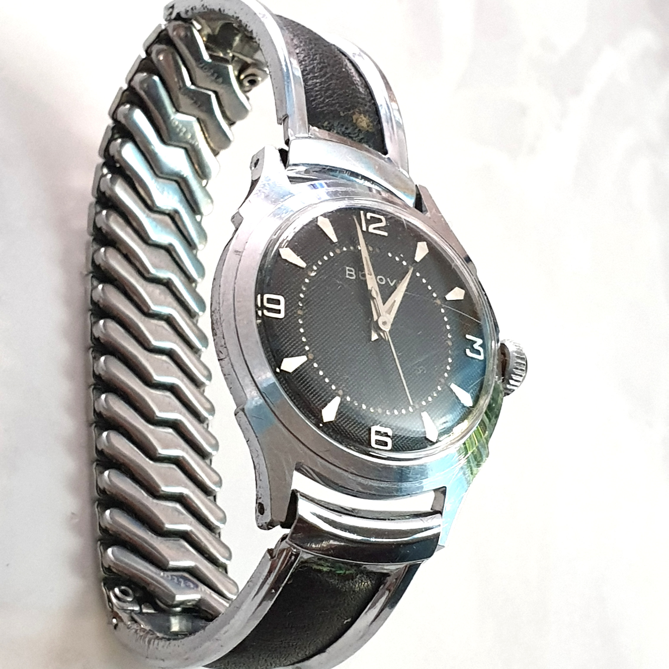 BULOVA MANUAL WIND WRISTWATCH WITH BLACK WAFFLE/HONEYCOMB DIAL IN CHROME PLATE CASE WITH ORIGINAL - Image 5 of 12