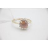 Fine 18ct gold orange topaz and diamond cluster ring. Fully hallmarked for 18ct gold. Uk size N