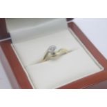Fine 18ct gold and 15 point diamond solitaire ring. Set in 18ct gold hallmarked with a estimated