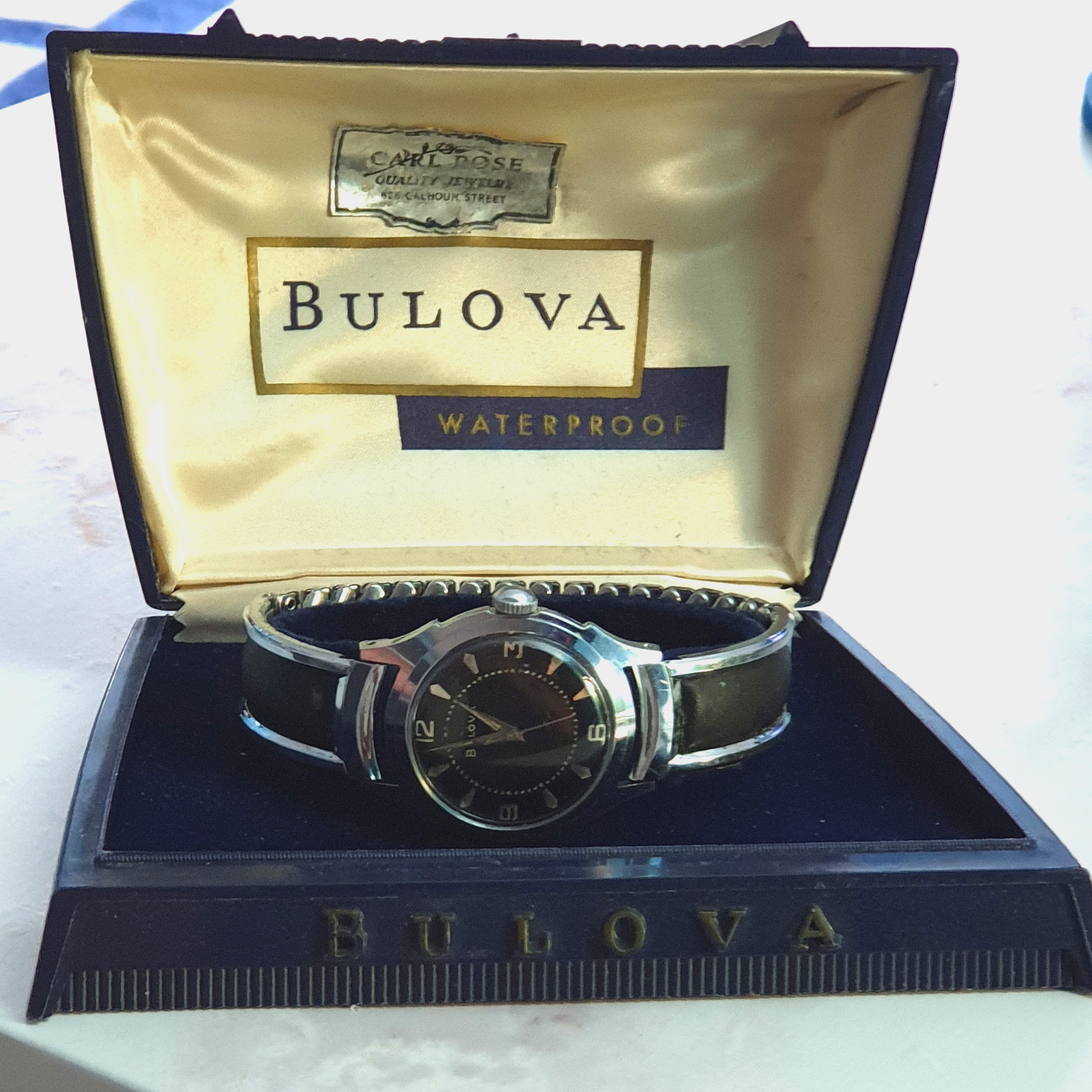 BULOVA MANUAL WIND WRISTWATCH WITH BLACK WAFFLE/HONEYCOMB DIAL IN CHROME PLATE CASE WITH ORIGINAL - Image 12 of 12