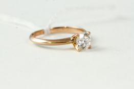 18kt Rose gold solitaire diamond ring, approximately 0.73cts G/SI1, weighs 2.3 grams . Uk size M,