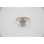 Fine 18ct Gold Diamond Cluster Ring Fully hallmarked for 18ct Gold. Total weight is 2.1grams. UK