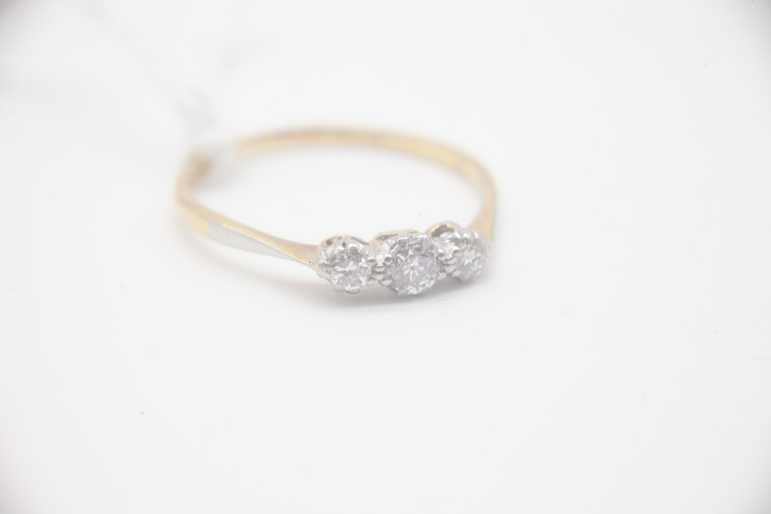 18ct Gold Diamond Three Stone Ring Marked 18CT PLAT by the maker HG&S with an estimated 40pts of