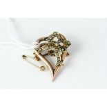 Antique 9ct gold and seedpearl heart brooch . Set in 9ct gold with seedpearls. Measures 3cm in