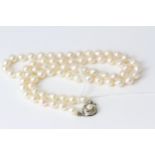 Vintage Silver and Cultured Baroque Tapered Pearl NecklaceSet with a Silver clasp marked 835. The