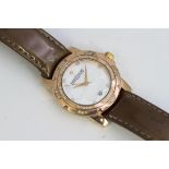 LADIES SAINT HONORE PARIS QUARTZ WRISTWATCH 36MM, Silver and mother of pearl dial with a diamond dot