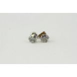 Fine 900 Platinum 2.03 Carat Diamond Stud Earrings They're marked PT900 and the stems of the